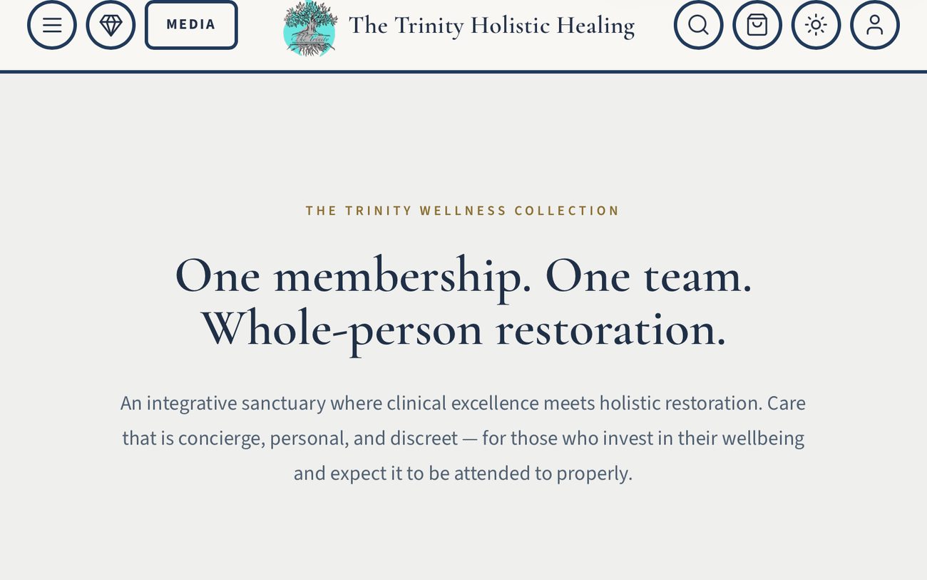 The Trinity website on a laptop