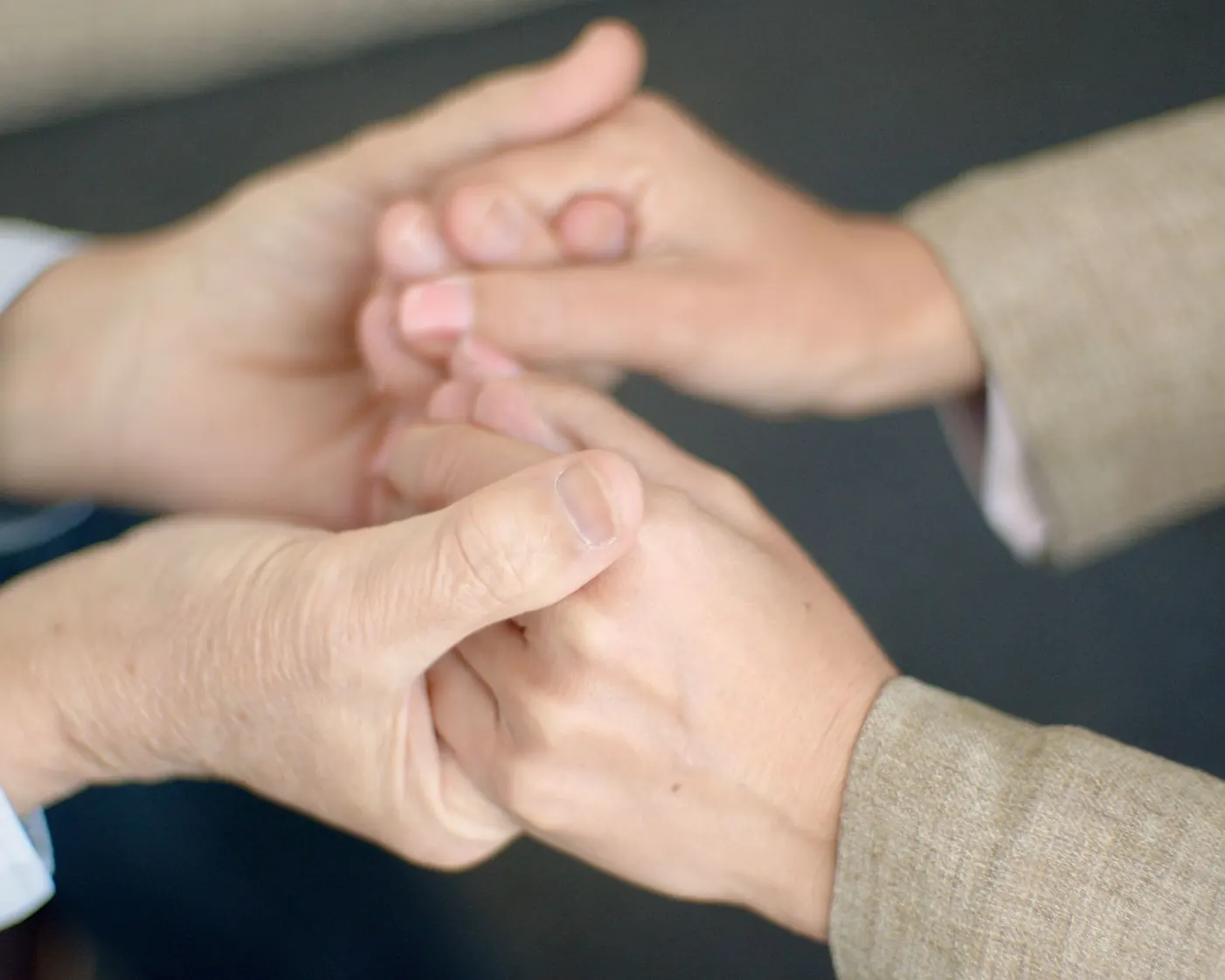 A couple holding hands โ relationship therapy at The Trinity A couple holding hands โ relationship therapy at The Trinity